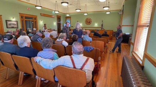 Logan County residents, commissioners debate infrastructure additions 