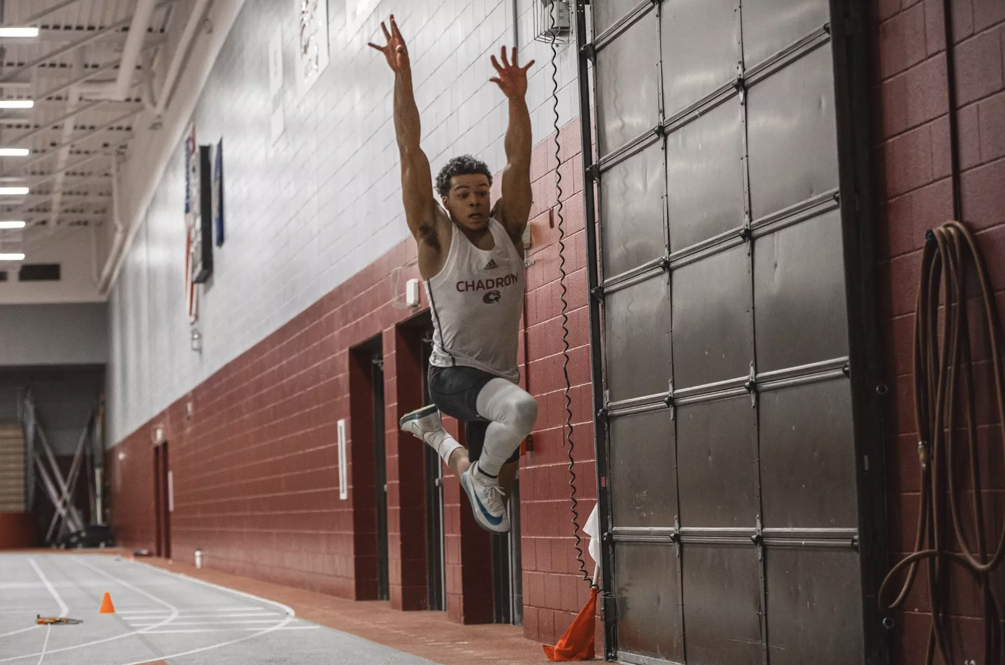 Bynes Breaks School Record, Leaps to Top of DII