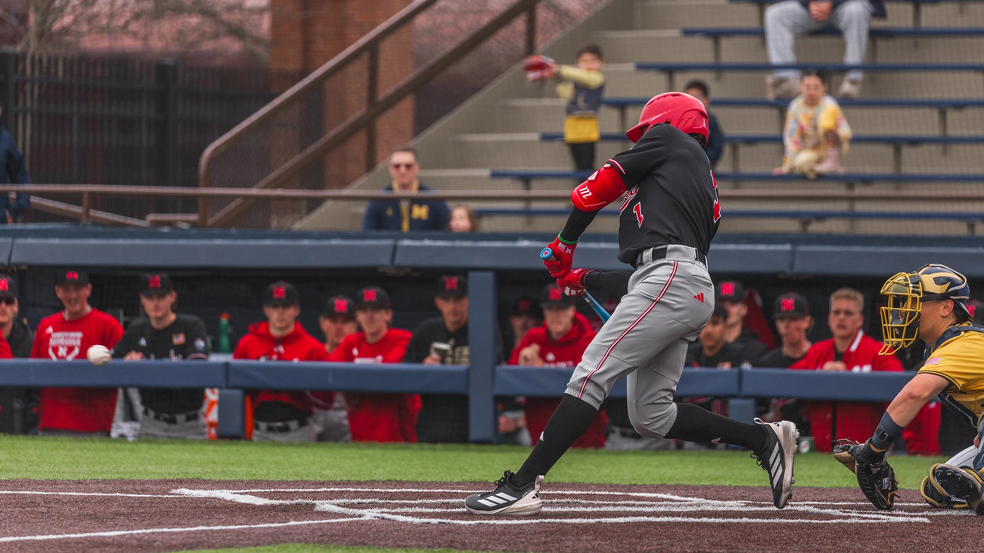 Huskers explode in ninth to rally past Michigan 9-5